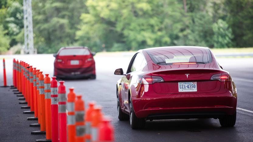 Joe Young, a media relations associate for the Insurance Institute for Highway Safety (IIHS), demonstrates a front crash prevention test on a 2018 Tesla Model 3 at the IIHS-HLDI Vehicle Research Center in Ruckersville, Virginia, U.S., July 22, 2019. Picture taken July 22, 2019. REUTERS/Amanda Voisard