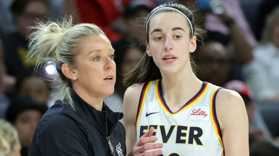 Getty Images - LAS VEGAS, NEVADA - MAY 25: Head coach Christie Sides of the Indiana Fever talks with Caitlin Clark #22 in the second quarter of a game against the Las Vegas Aces at Michelob ULTRA Arena on May 25, 2024 in Las Vegas, Nevada. The Aces defeated the Fever 99-80. NOTE TO USER: User expressly acknowledges and agrees that, by downloading and or using this photograph, User is consenting to the terms and conditions of the Getty Images License Agreement. (Photo by Ethan Miller/Getty Images)