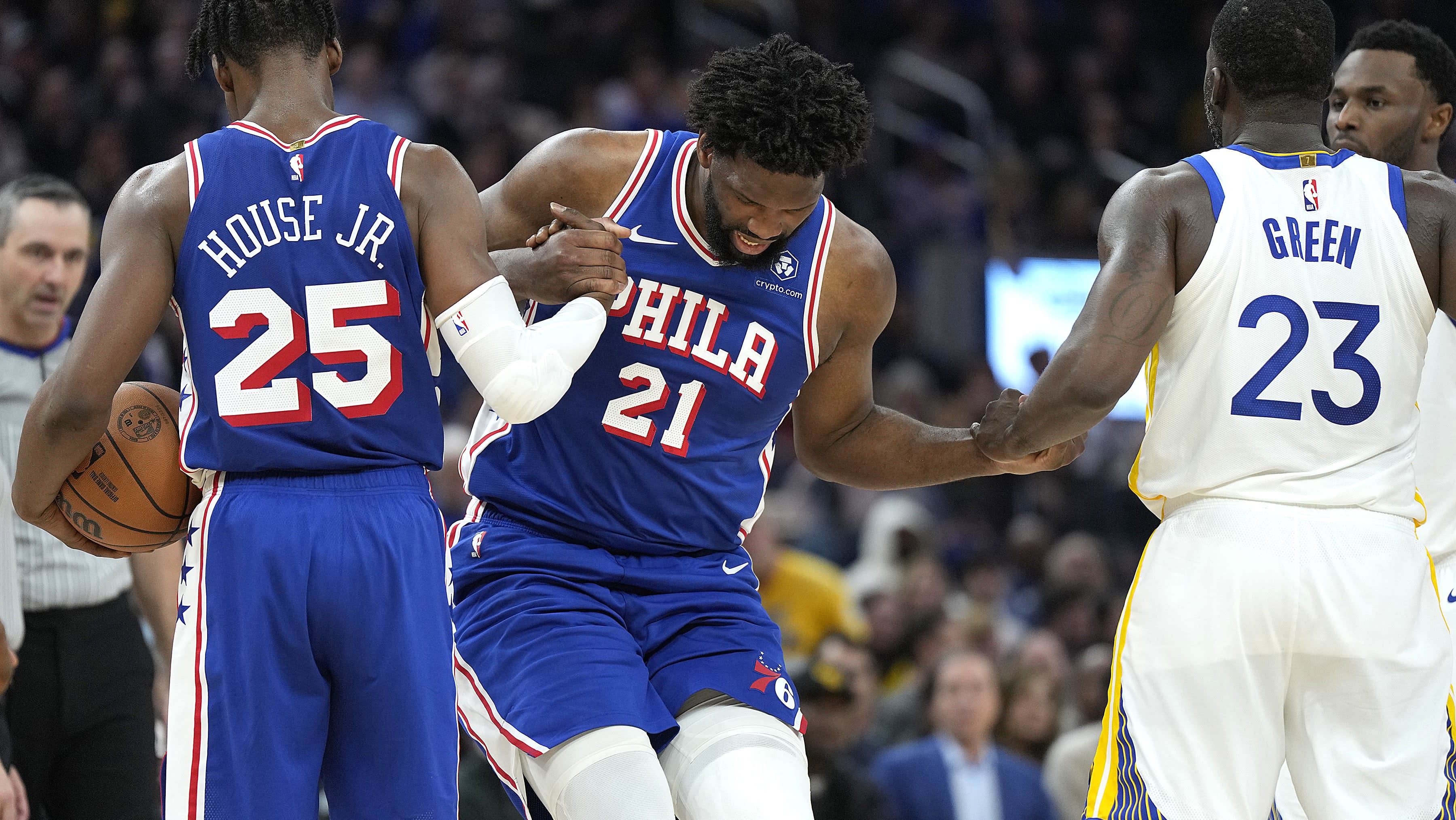 Embiid leaves game after Kuminga falls on bad knee