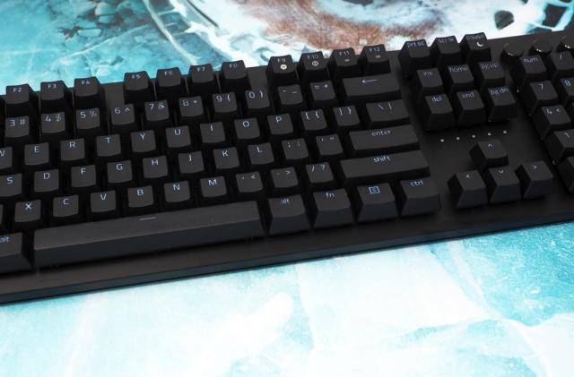 Black keyboard on a blue background