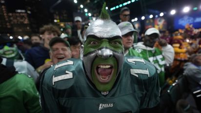 Associated Press - A Philadelphia Eagles fan cheers during the first round of the NFL football draft, Thursday, April 25, 2024, in Detroit. (AP Photo/Paul Sancya)