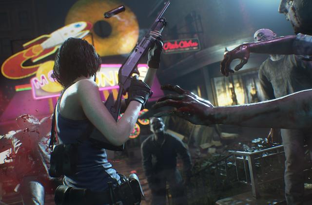 Still from the Resident Evil 3 remake. Protagonist Jill Valentine holds a rifle as she’s swarmed by hoards of zombies. Neon signs in the background.