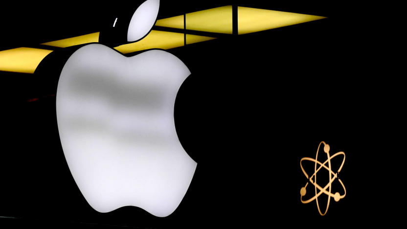 FILE - The Apple logo is illuminated at a store in Munich, Germany, Nov. 13, 2023. The dependence — and extreme vulnerability — starts with the interconnections that bind our computers, phones and other devices. (AP Photo/Matthias Schrader, File)