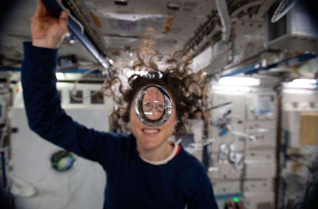 Christina Koch with a water bubble in the Kibo lab