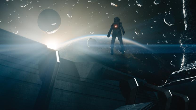 A figure wearing a spacesuit is positioned above a spaceship, looking out at a field of asteroids and a sun poking over the edge of a planet.