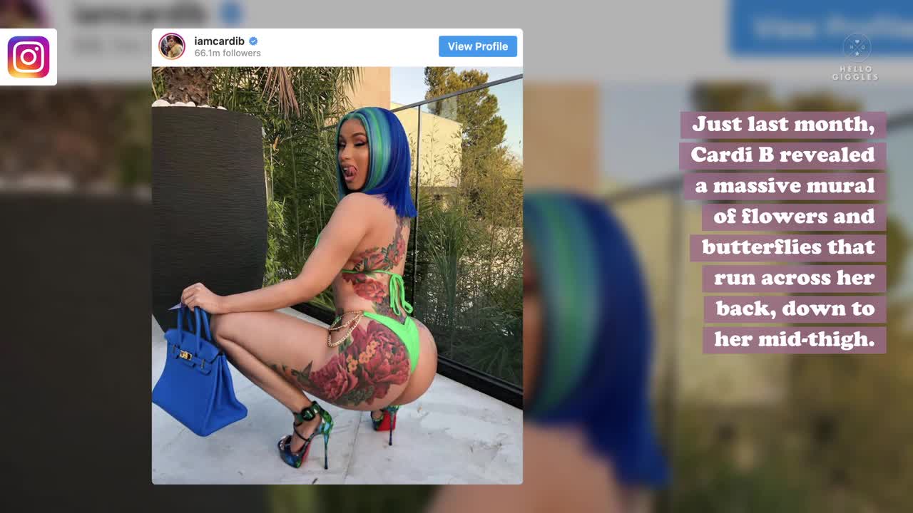 Cardi B Reveals MASSIVE Peacock Tattoo And It Looks PAINFUL! 