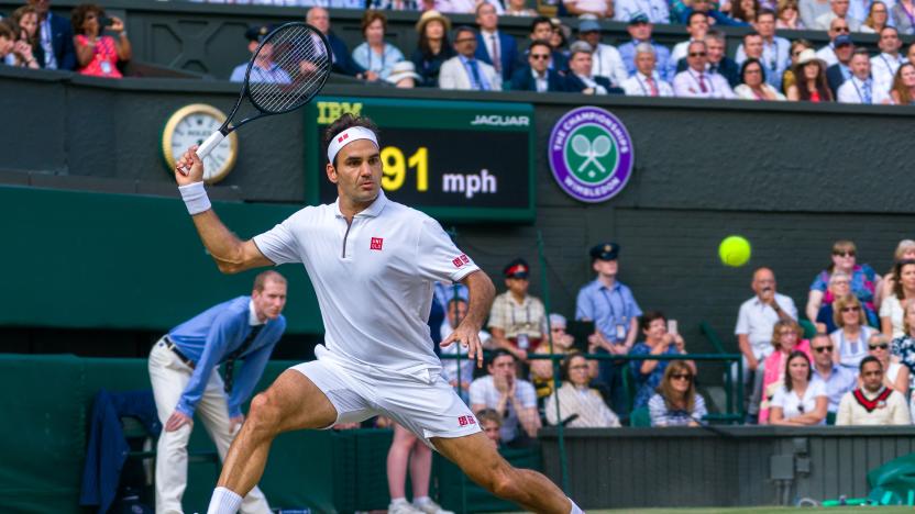 LONDON, ENGLAND - JULY 14: Roger Federer of Switzerland play a forehand in his Men's Singles final against Novak Djokovic of Serbia during Day thirteen of The Championships - Wimbledon 2019 at All England Lawn Tennis and Croquet Club on July 14, 2019 in London, England. (Photo by Andy Cheung/Getty Images)