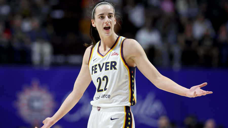 Getty Images - UNCASVILLE, CONNECTICUT - MAY 14: Caitlin Clark #22 of the Indiana Fever reacts after a foul during the first quarter against the Connecticut Sun in the game at Mohegan Sun Arena on May 14, 2024 in Uncasville, Connecticut. NOTE TO USER: User expressly acknowledges and agrees that, by downloading and or using this photograph, User is consenting to the terms and conditions of the Getty Images License Agreement. (Photo by Elsa/Getty Images)