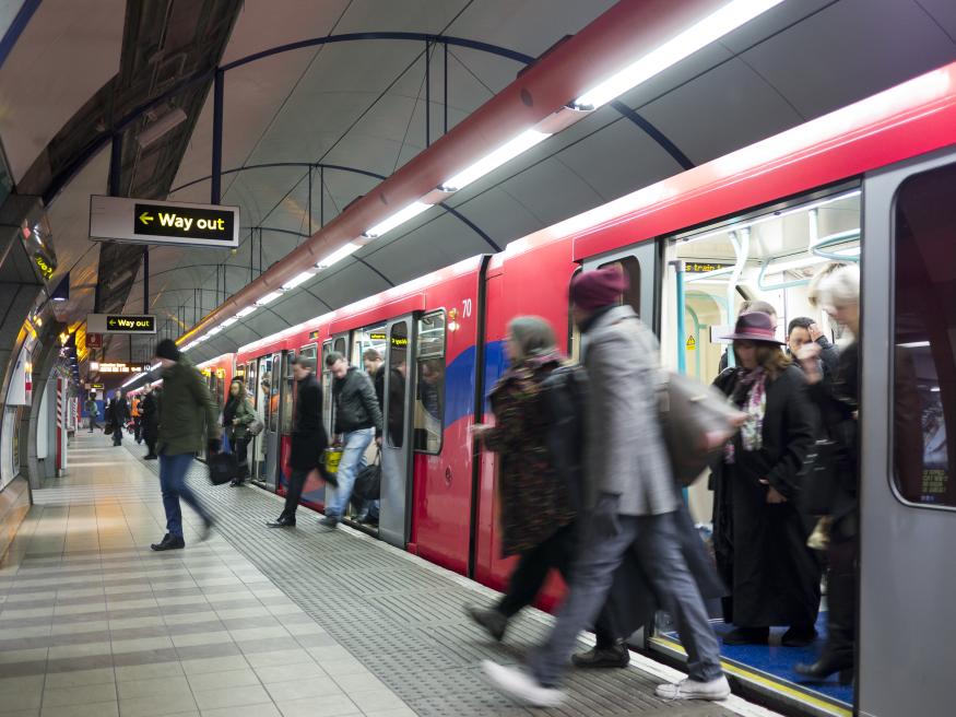 Commuters using the London Underground transport system.