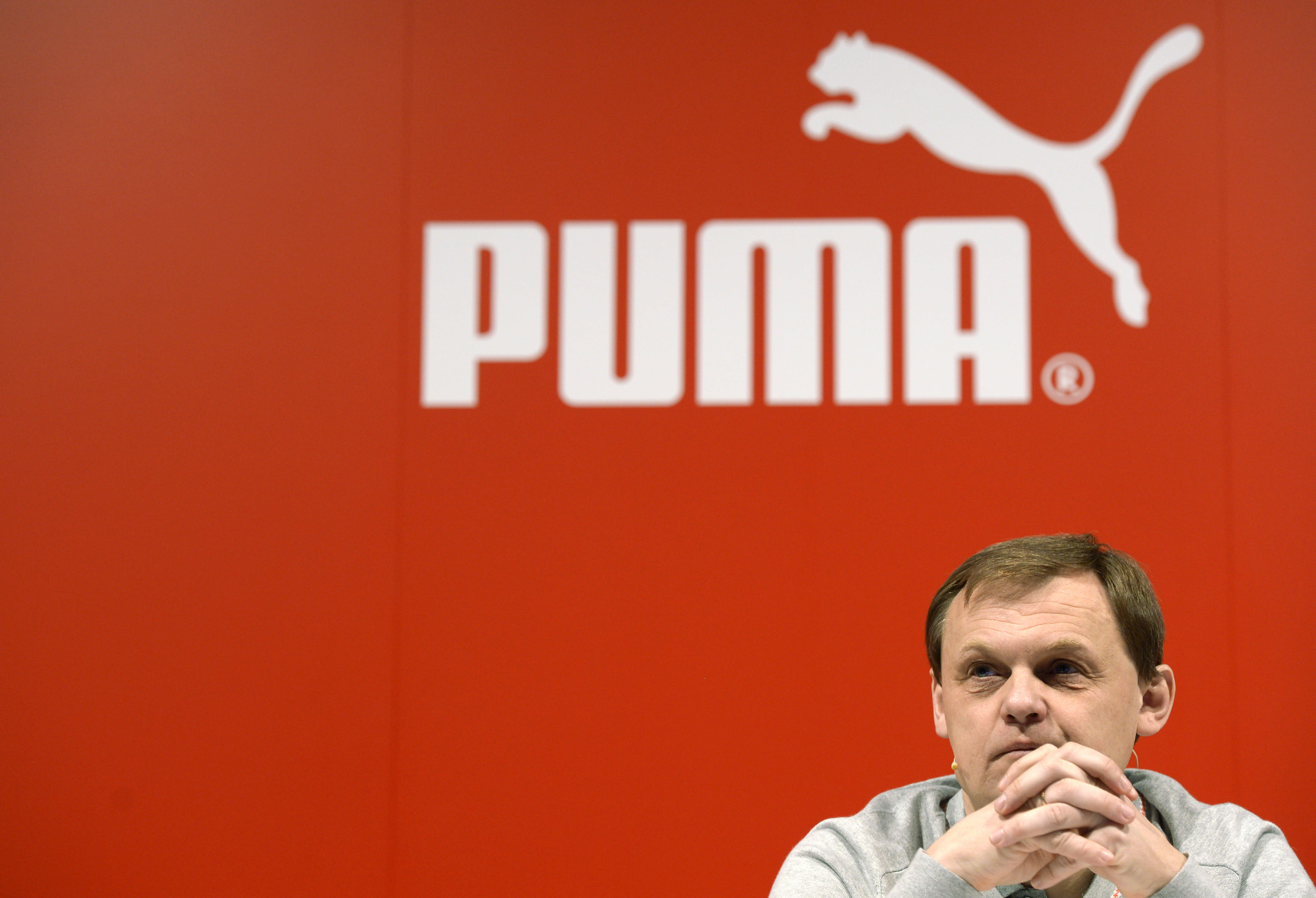 Puma profit hit by strong euro, taxes