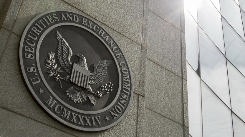 FILE - The seal of the U.S. Securities and Exchange Commission at SEC headquarters, June 19, 2015, in Washington. The Securities and Exchange Commission said Tuesday, Jan. 9, 2024, that a post on X, formerly known as Twitter, announcing that the securities regulator had approved the trading of exchange-traded funds holding bitcoin was fake, and that the agency’s account had been “compromised.” (AP Photo/Andrew Harnik, File)