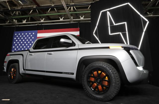 FILE - This Thursday, June 25, 2020, file photo shows the electric Endurance pickup at Lordstown Motors Corp., in Lordstown, Ohio. Shares of Lordstown Motors are tumbling before the market open Tuesday, May 25, 2021, after the electric light duty truck maker indicated it will need to raise more money to produce some vehicles. (AP Photo/Tony Dejak, File)