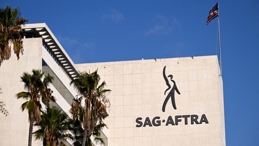 The SAG-AFTRA logo is displayed outside of the National Headquarters on Wilshire Blvd during the actors strike in Los Angeles, California on October 24, 2023. SAG-AFTRA members walked off film and TV sets in July, over terms including pay and the use of artificial intelligence. The strike has surpassed 100 days, and a series of high-level talks abruptly collapsed in acrimonious fashion. (Photo by Patrick T. Fallon / AFP) (Photo by PATRICK T. FALLON/AFP via Getty Images)