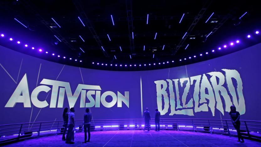 FILE - The Activision Blizzard Booth is shown on June 13, 2013 the during the Electronic Entertainment Expo in Los Angeles. Microsoft is buying Activision Blizzard, Tuesday, Jan. 18, 2022,  for $68.7 billion to gain access to blockbuster games including Call of Duty and Candy Crush. The all-cash deal will let Microsoft accelerate mobile gaming and provide it building blocks for the metaverse, or a virtual environment.