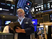 Stock market today: Dow and S&P 500 notch record highs as earnings season kicks off