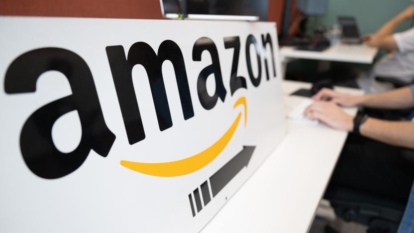 14 September 2023, Saxony, Dresden: An Amazon software developer sits at a desk during a press event at the online retailer's research and development site. Amazon is celebrating its tenth anniversary in Dresden. Photo: Sebastian Kahnert/dpa (Photo by Sebastian Kahnert/picture alliance via Getty Images)