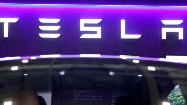 Tesla expects to book over $350M in costs for layoffs