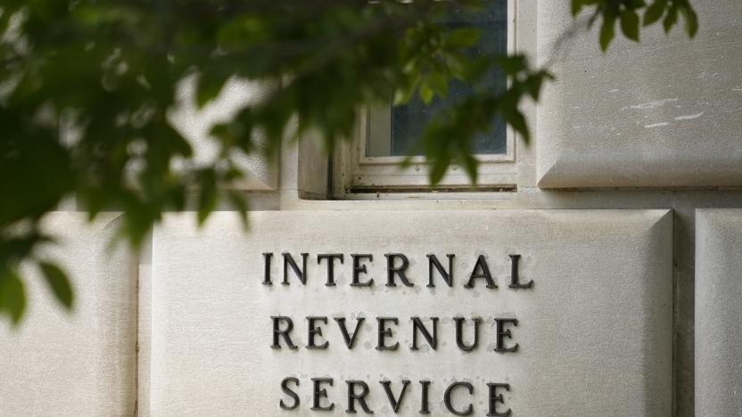 FILE - A sign outside the Internal Revenue Service building in Washington, on May 4, 2021. Most taxpayers will be able to digitally submit a slew of tax documents and other communications to the IRS next filing season and the agency plans to go completely paperless in 2025. (AP Photo/Patrick Semansky, File)