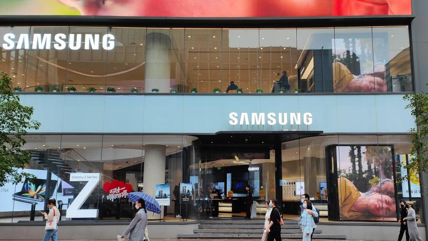 SHANGHAI, CHINA - NOVEMBER 11, 2022 - Pedestrians pass the Samsung flagship store in Shanghai, China, Nov 11, 2022. (Photo credit should read CFOTO/Future Publishing via Getty Images)