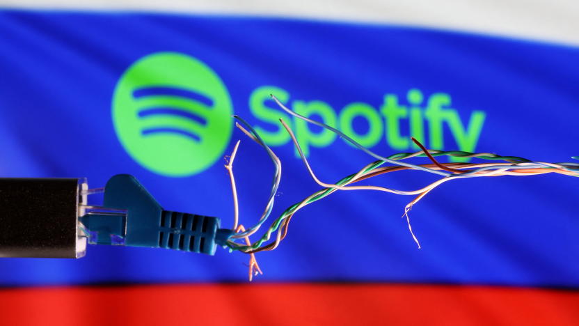 Broken Ethernet cable is seen in front of Russian flag and Spotify logo in this illustration taken March 11, 2022. REUTERS/Dado Ruvic/Illustration