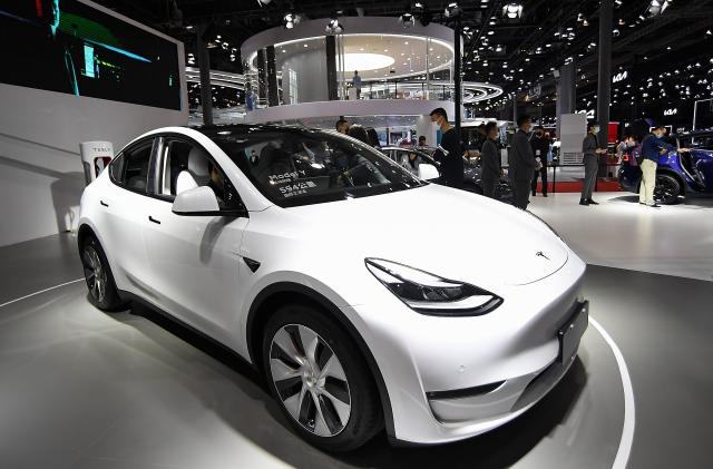 SHANGHAI, CHINA - APRIL 20:  A Tesla Model Y car is on displayed during the 19th Shanghai International Automobile Industry Exhibition, also known as Auto Shanghai 2021, at National Exhibition and Convention Center (Shanghai) on April 20, 2021 in Shanghai, China.  (Photo by Zhe Ji/Getty Images)