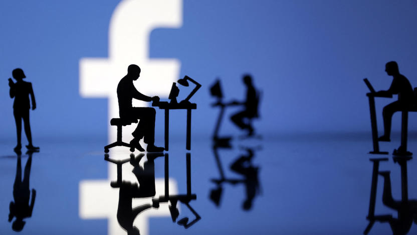 Figurines with computers and smartphones are seen in front of Facebook logo in this illustration, July 24, 2022. REUTERS/Dado Ruvic/Illustration