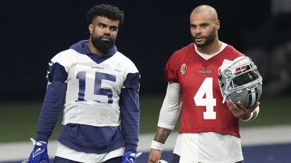 Associated Press - Dallas Cowboys quarterback Dak Prescott (4) and running back Ezekiel Elliott (15) during an NFL football team practice in Frisco, Texas, Wednesday, May 22, 2024. (AP Photo/LM Otero)