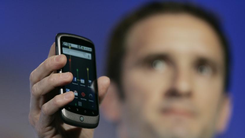 Mario Queiroz, Vice President of Product Management for Google, holds up the Nexus One smartphone running on the Google Android platform, the first mobile phone the internet company will sell directly to consumers, during a news conference at Google headquarters in Mountain View, California on January 5, 2010.    AFP PHOTO/Robert Galbraith/POOL (Photo by - / POOL / AFP)        (Photo credit should read -/AFP via Getty Images)