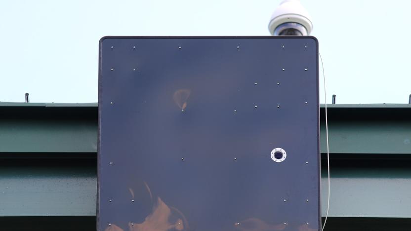 NEW BRITAIN, CT - JULY 30: A Doppler radar that discerns balls and strikes is pictured at New Britain Stadium in New Britain, CT on July 30, 2019. For the first time, the independent Atlantic League is experimenting with "robo-umpires" during a game between the home team, New Britain Bees, and the Long Island Ducks. The home plate umpire, Timothy Rosso wore an earpiece in which he heard the balls and strikes called. Last month, the independent Atlantic League announced that, in partnership with Major League Baseball, it would be implementing a number of experimental rule changes for the remainder of its season, with the idea they might eventually be adopted at the games highest level. Of those rule changes, none has generated the same type of heated reaction as TrackMan, a computerized system that uses Doppler radar to track every pitch and instantly transmits the result - ball or strike - to an earpiece worn by the home plate umpire. (Photo by John Tlumacki/The Boston Globe via Getty Images)