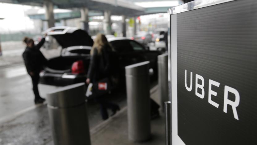 FILE - In this March 15, 2017, file photo, a sign marks a pick up point for the Uber car service at LaGuardia Airport in New York. Uber will resume testing autonomous vehicles in an area near Downtown Pittsburgh starting Thursday, Dec. 20, 2018. (AP Photo/Seth Wenig, File)