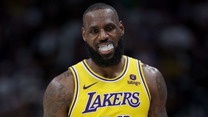 Getty Images - DENVER, COLORADO - APRIL 22:  LeBron James #23 of the Los Angeles Lakers walks back to his bench while playing the Denver Nuggets in the fourth quarter during game two of the Western Conference First Round Playoffs at Ball Arena on April 22, 2024 in Denver, Colorado. NOTE TO USER: User expressly acknowledges and agrees that, by downloading and or using this photograph, User is consenting to the terms and conditions of the Getty Images License Agreement. (Photo by Matthew Stockman/Getty Images)