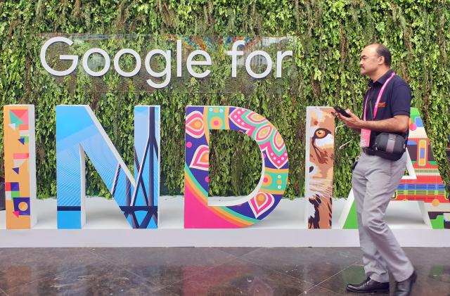 A man walks past the sign of "Google for India", the company's annual technology event in New Delhi, India, September 19, 2019. REUTERS/Sankalp Phartiyal
