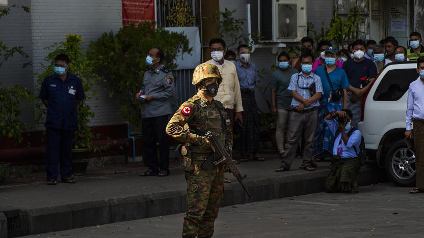 YANGON, MYANMAR - FEBRUARY 02: An armed soldier stands guard in front of a Hindu temple in the downtown area in Yangon, Myanmar on February 02, 2021. Myanmar's military announced Monday that it has seized power and will rule the country for at least one year after detaining its top political leaders. (Photo by Stringer/Anadolu Agency via Getty Images)