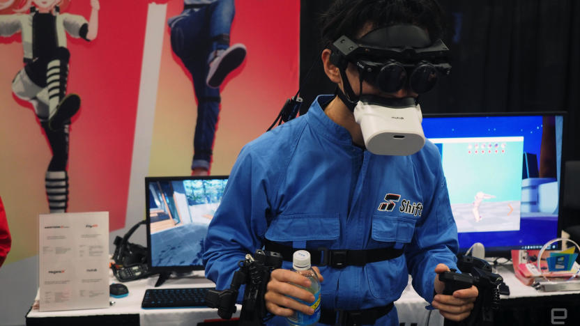 Image of a person demonstrating all of Shiftall's VR technology.