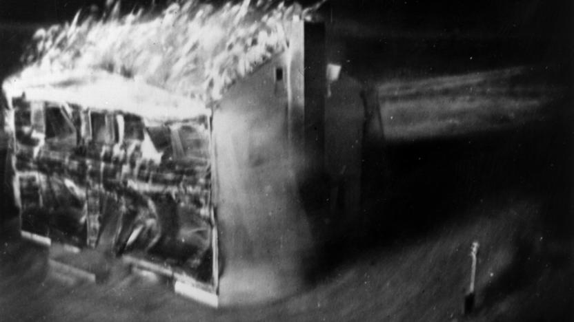 Atom bomb tests in Nevada. The destruction is photographed by a motion picture camera located 60 feet from the doomed house, which is encased in a two inch deep lead sheath.  It shoots 24 frames per second - the time from the first to the last picture (eight were taken) was only 2 1/3 seconds.  The only source of light was the atom bomb. Original Artwork: Image by Edgerton, Getrmeshausen and Grier Inc. for AEC.   (Photo by Keystone/Getty Images)