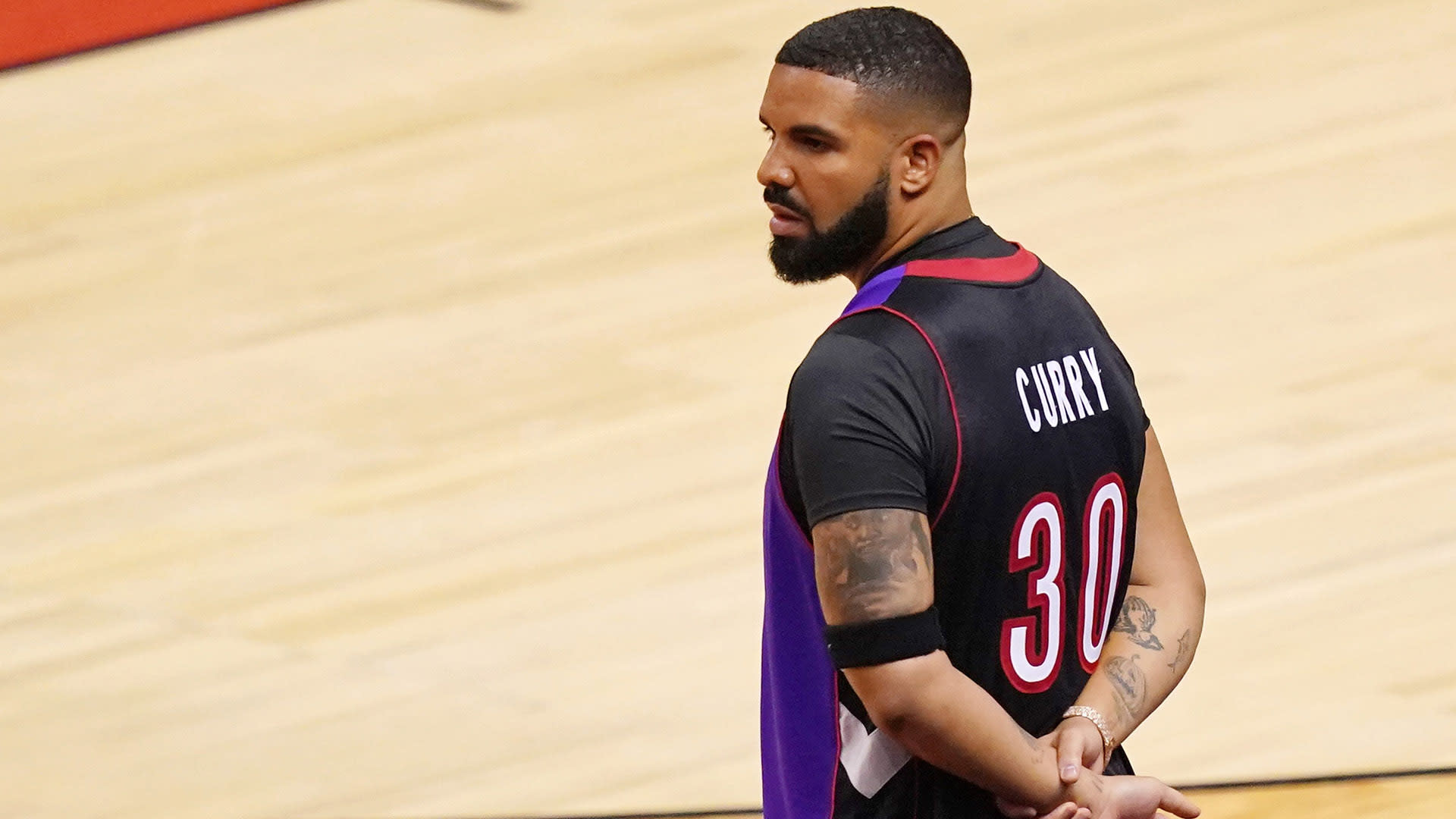 drake in dell curry jersey