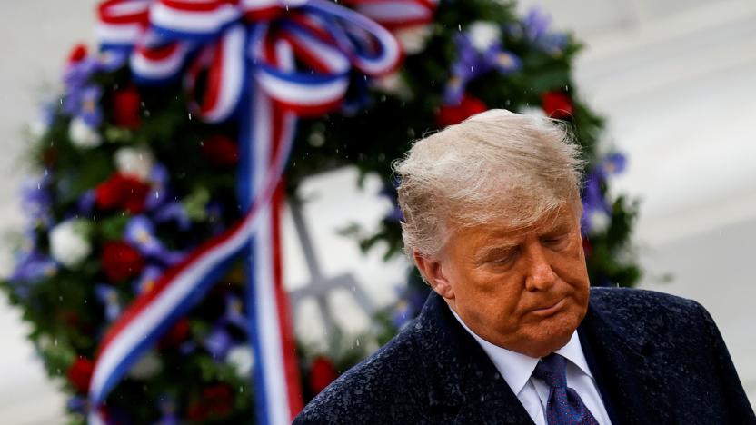 U.S. President Donald Trump departs after placing a wreath at the Tomb of the Unknown Soldier as he attends a Veterans Day observance in the rain at Arlington National Cemetery in Arlington, Virginia, U.S., November 11, 2020. REUTERS/Carlos Barria     TPX IMAGES OF THE DAY
