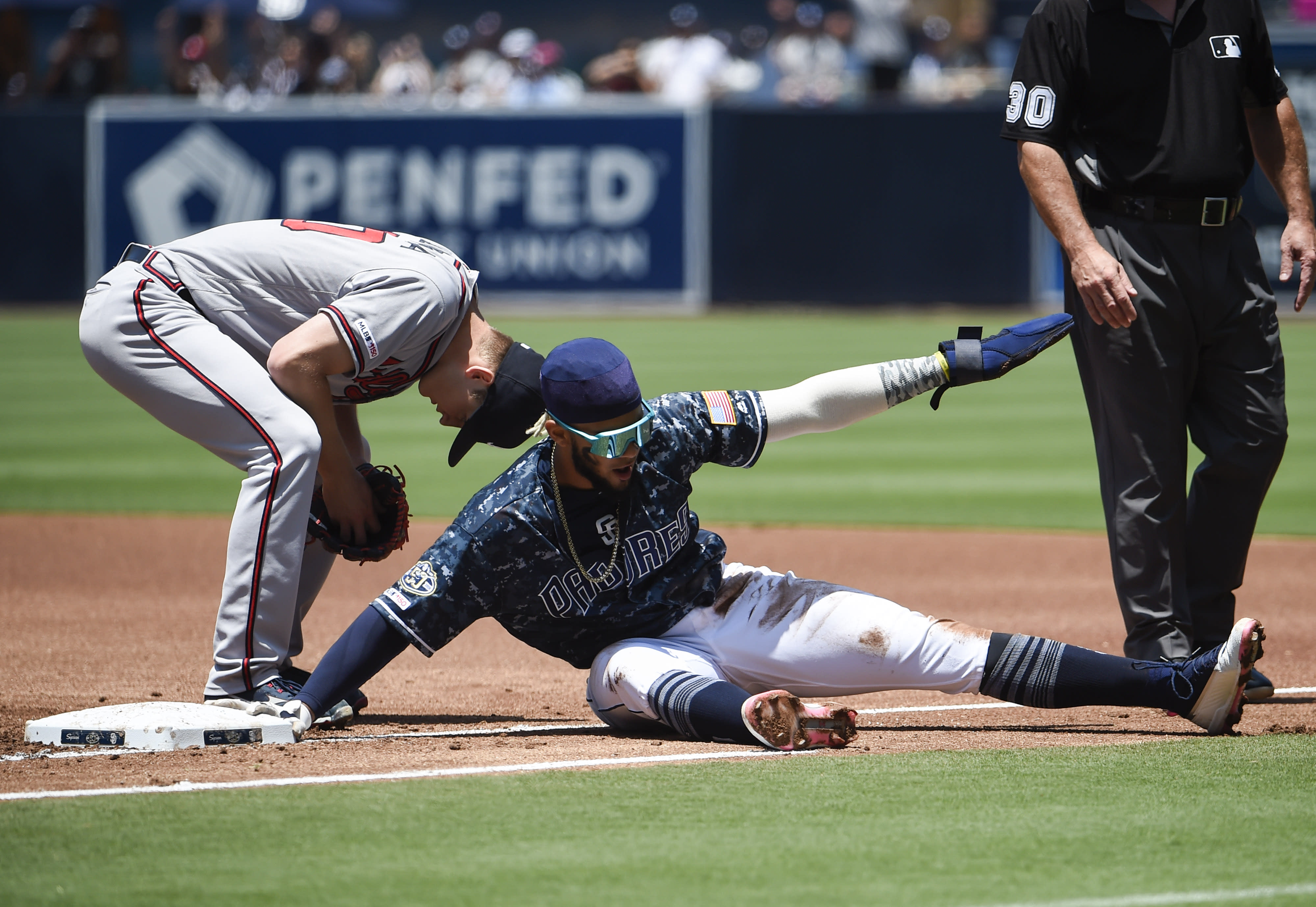 Image result for fernando tatis jr slide back to first