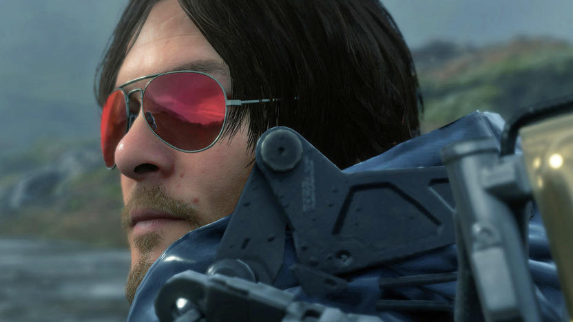 A still from the video game 'Death Stranding' showing the closeup of a character wearing red-tinted sunglasses.