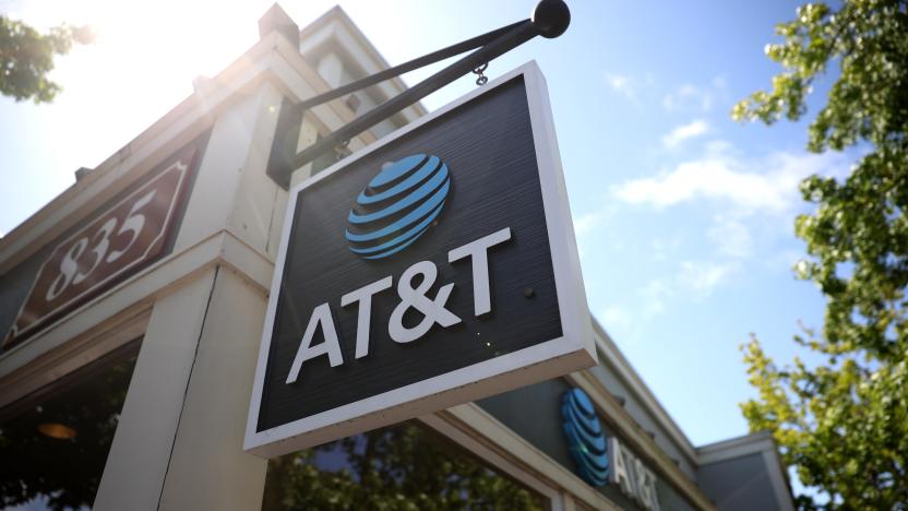 SAN RAFAEL, CALIFORNIA - MAY 17: A sign is posted in front of an AT&T retails store on May 17, 2021 in San Rafael, California. AT&T,  the world’s largest telecommunications company, announced a deal with Discovery, Inc. which will spin off AT&T's WarnerMedia and be combined with Discovery to create a new standalone media company. (Photo by Justin Sullivan/Getty Images)