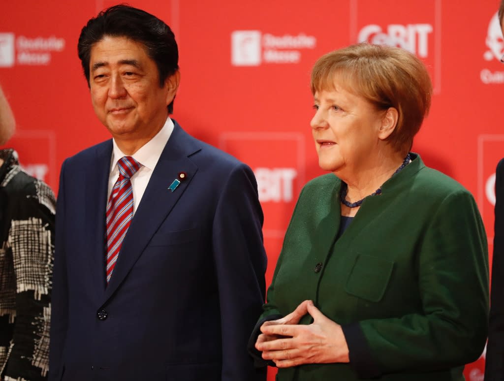 Abe, Merkel call for open markets