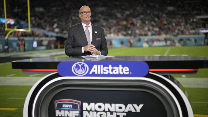 ESPN Monday Night Football host Scott Van Pelt works from the sideline set during halftime of an NFL football game between the Jacksonville Jaguars and the Cincinnati Bengals, Monday, Dec. 4, 2023, in Jacksonville, Fla. (AP Photo/Phelan M. Ebenhack)