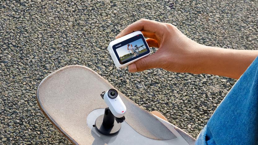 The Insta360 Go 3 with its thumb-sized camera detached from its 'Action Pod' body for remote viewing.