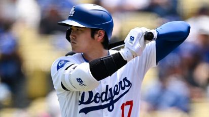 Reuters - Apr 20, 2024; Los Angeles, California, USA; Los Angeles Dodgers designated hitter Shohei Ohtani (17) on deck against the New York Mets during the first inning at Dodger Stadium. Mandatory Credit: Jonathan Hui-USA TODAY Sports