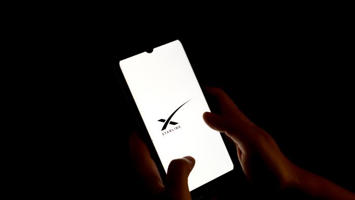 In this photo illustration a Starlink logo seen displayed on a smartphone screen in Chania, Greece on August 15, 2023. (Photo illustration by Nikolas Kokovlis/NurPhoto via Getty Images)