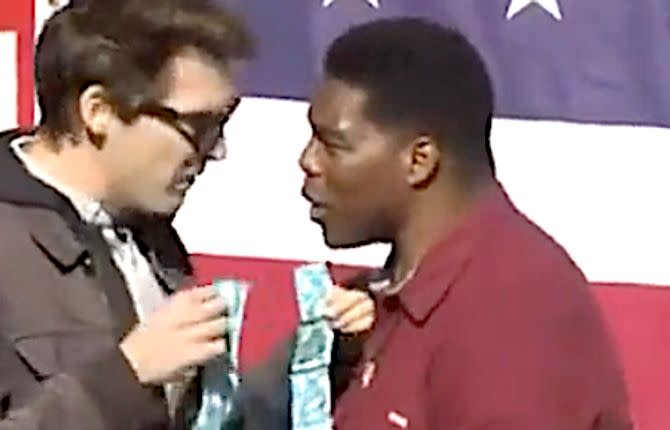 Prankster Interrupts Herschel Walker Event To Hand Him Condoms