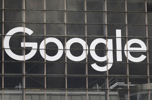 The logo of Google is seen on a building at la Defense business and financial district in Courbevoie near Paris, France, September 1, 2020.  REUTERS/Charles Platiau