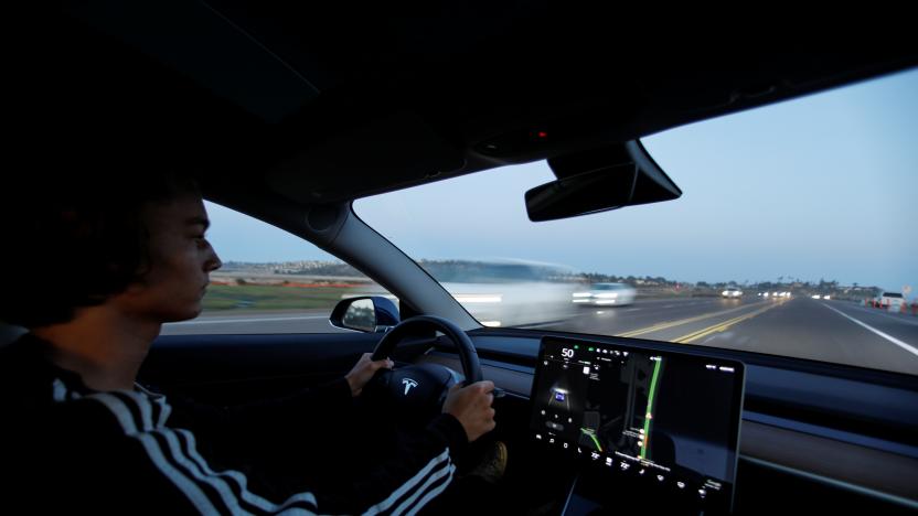 The interior of a 2018 Tesla Model 3 electric vehicle is shown in this photo illustration taken in Cardiff, California, U.S., June 1, 2018. Picture taken June 1, 2018.    REUTERS/Mike Blake