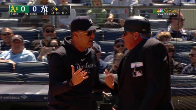 Hot mic catches odd umpire interaction after Aaron Boone ejected