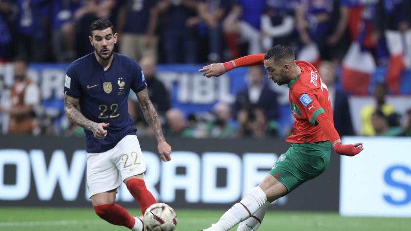 AL KHOR, QATAR - DECEMBER 14: Theo Hernandez (22) of France in action against Hakim Ziyech (R) of Morocco during the FIFA World Cup Qatar 2022 semi-final match between France and Morocco at Al Bayt Stadium on December 14, 2022 in Al Khor, Qatar. (Photo by Fareed Kotb/Anadolu Agency via Getty Images)